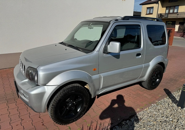 Suzuki Jimny cena 33900 przebieg: 166000, rok produkcji 2011 z Radomsko małe 497